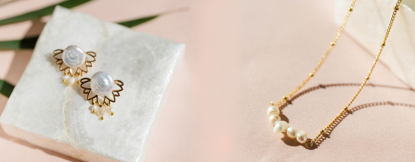 Philippine Pearl Jewelry, a pair of flower-inspired earrings on the left and a dainty necklace on the right