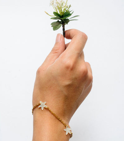 Tres Santan Mother of Pearl Flower Bracelet in White - Lily Jewelry