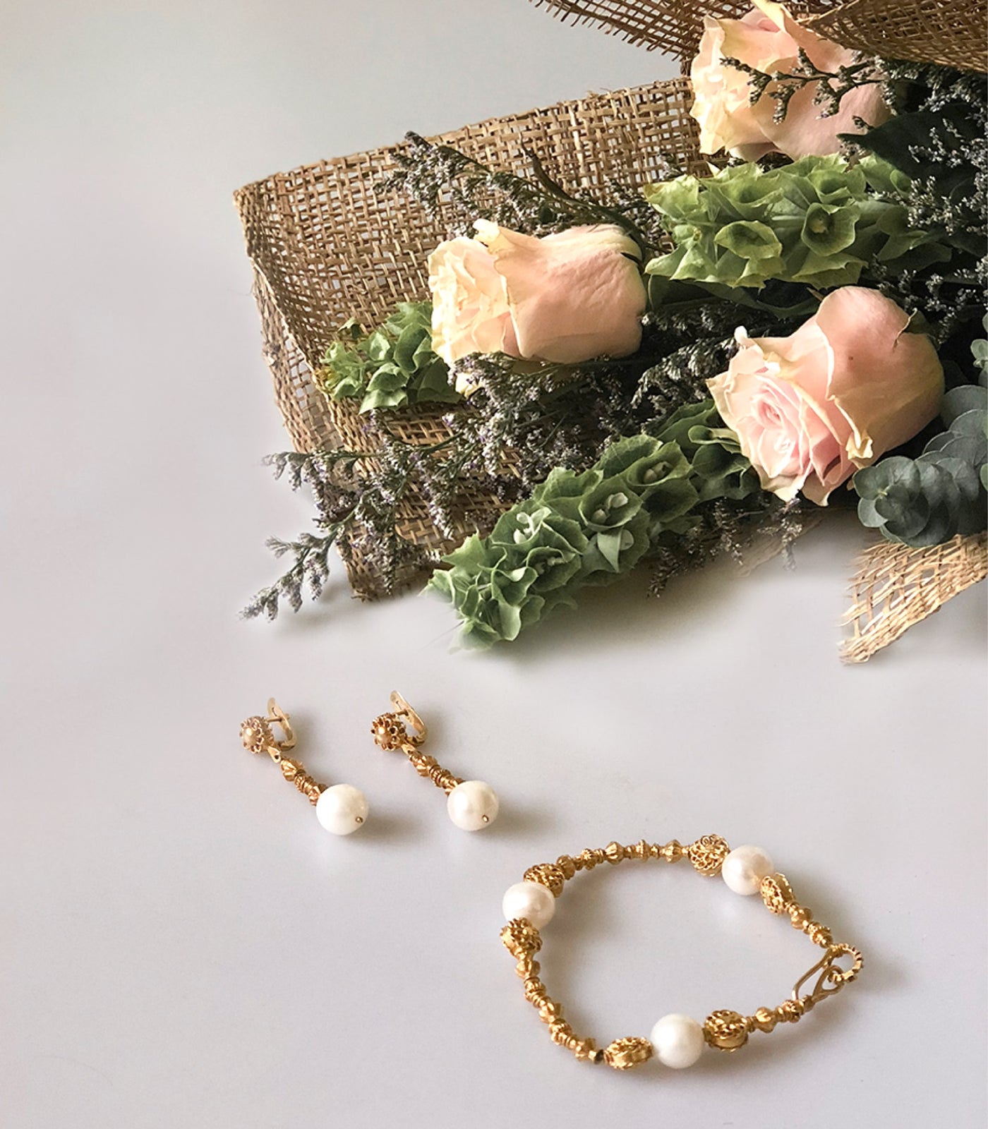 AMAMI Pearl Tambourine Bracelet on the table